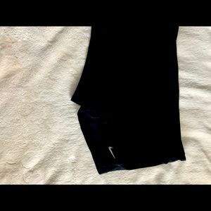 Medium nike swimming shorts.